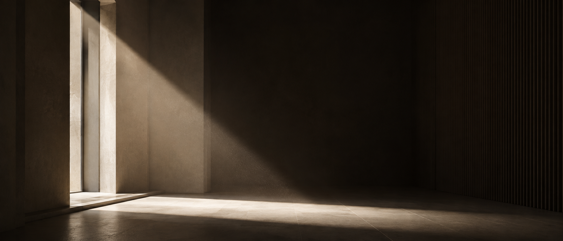 A shaft of sunlight across an empty interior